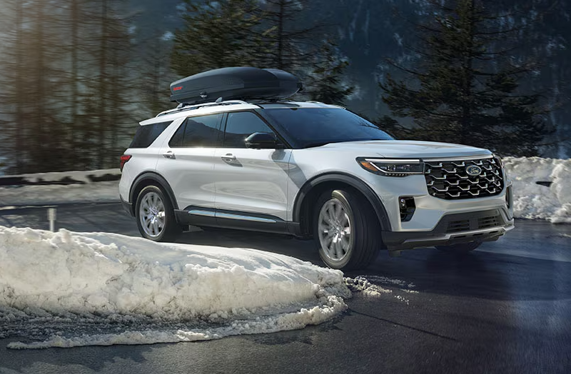 White 2026 Ford Explorer with case on roof