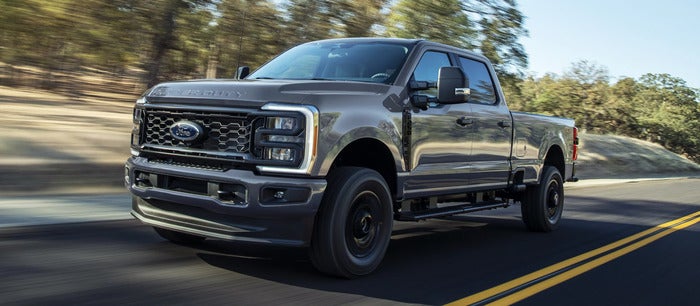 Ford Super Duty driving on road