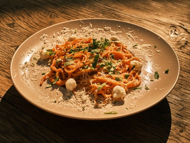 Traditional Italian spaghetti with fresh cheese