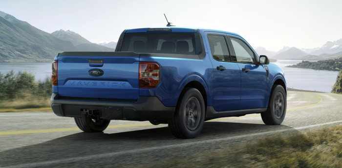 Blue 2025 Ford Maverick driving on the road