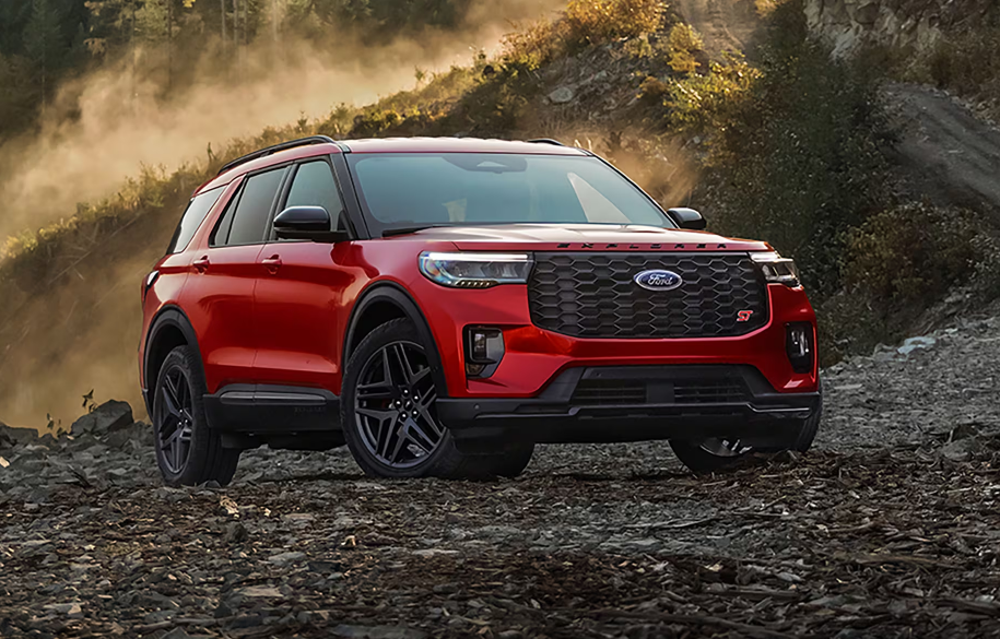 Red 2025 Ford Explorer ST parked on a trail