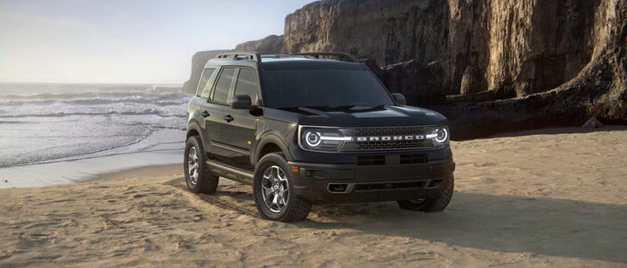 black ford bronco sport on a beach
