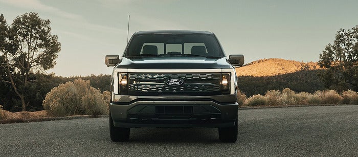 Gray Ford F-150 lightning facing the front