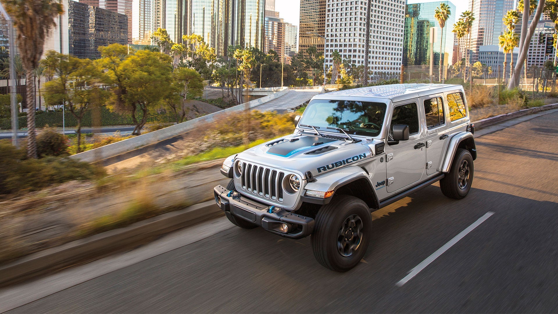 Jeep Wrangler 4xe on a city road — Ohio commuter use case