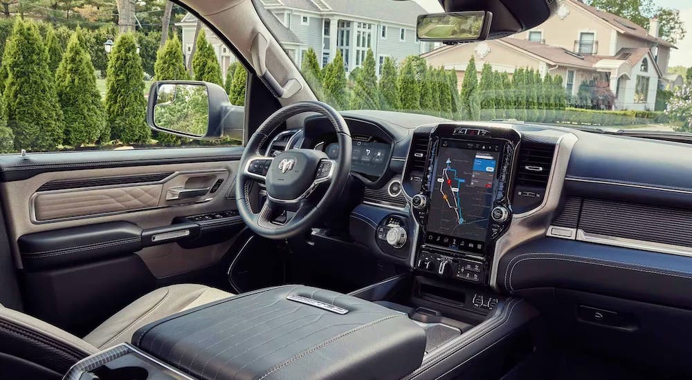 Black and tan interior of a 2023 Ram 1500.
