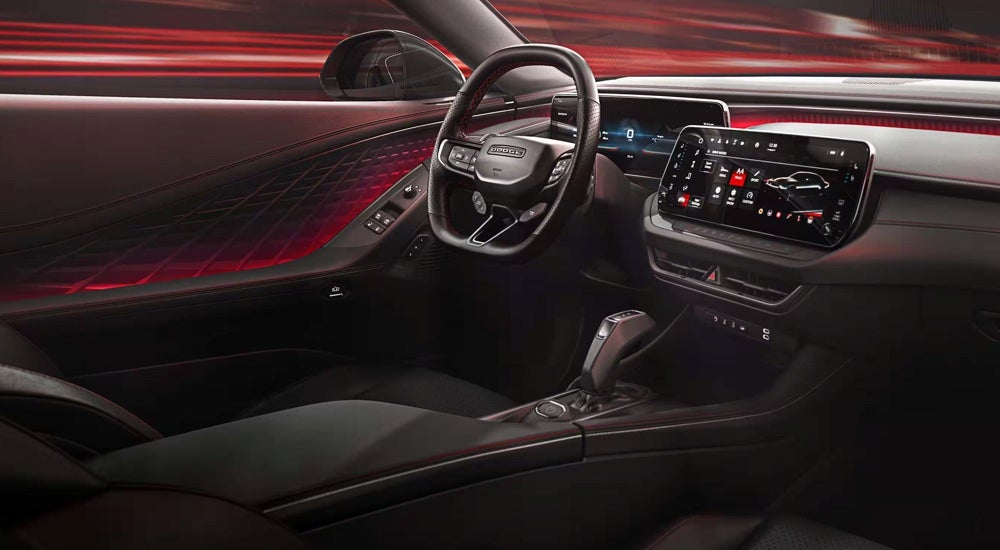 The driver's seat in the cabin of a 2025 Dodge Charger.
