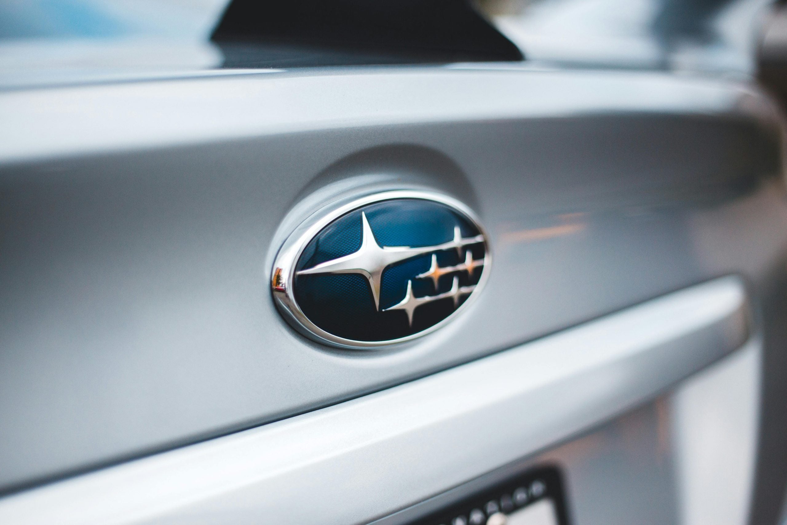 Close up of Subaru Emblem on Livery