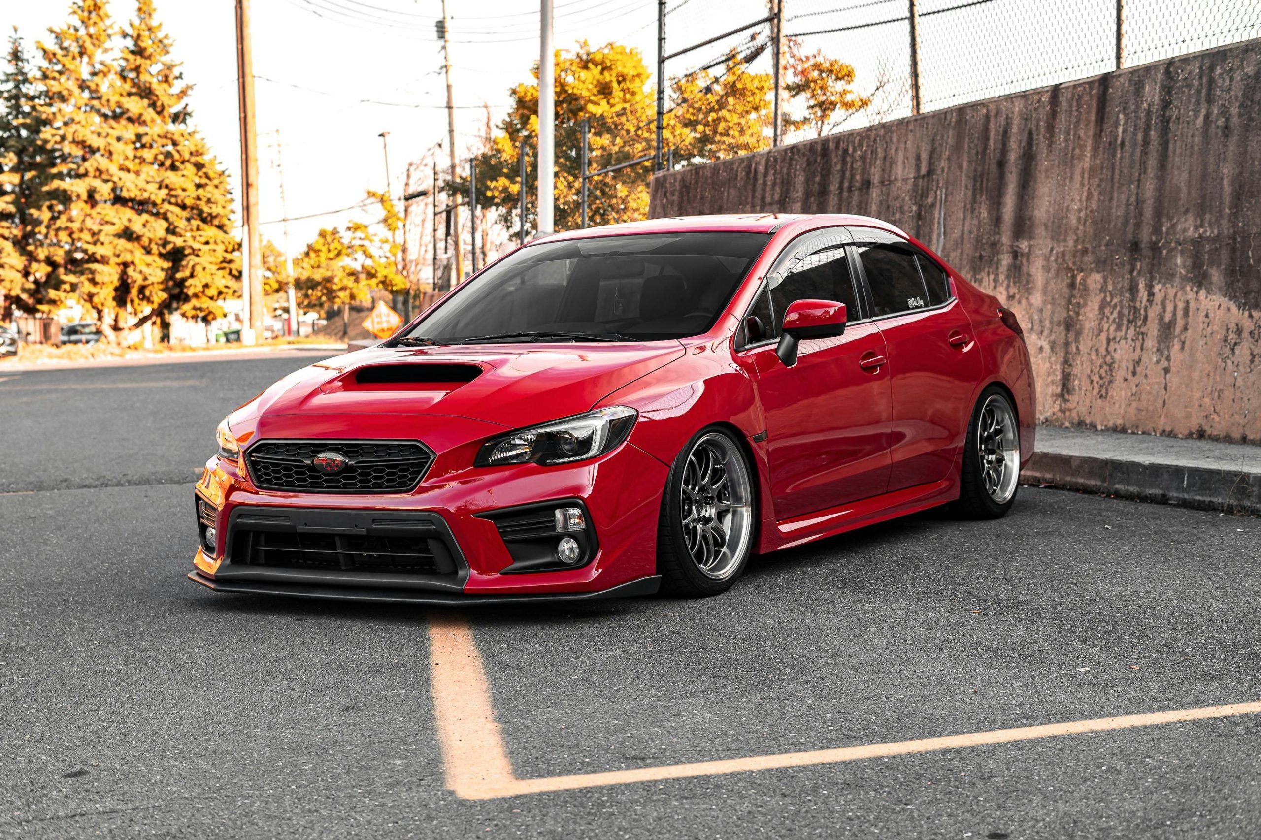 Red Subaru Sedan on Road