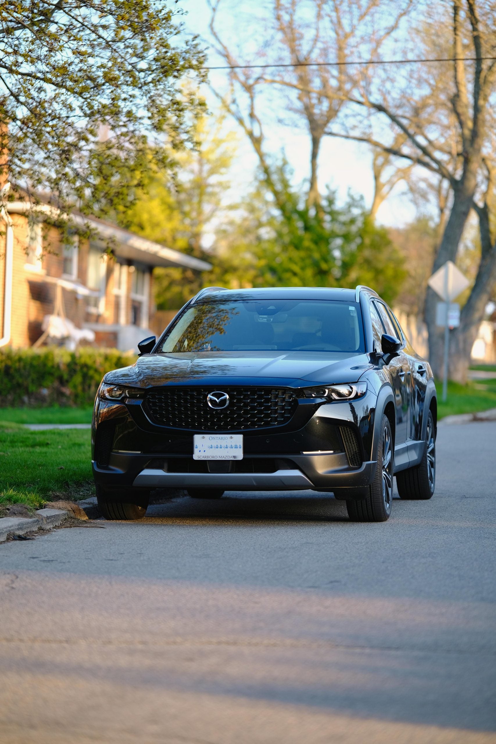A Mazda CX-50 Parked on the Side of the Street