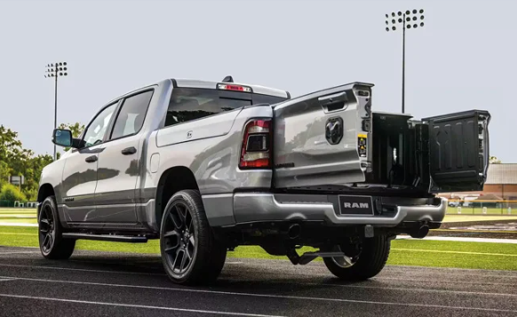 An open rear gate of a 2024 RAM 1500 parked near Anderson, Indiana