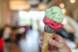 Person holding ice cream cone