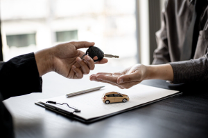 A perfon purchasing a new car near Indianapolis, Indiana