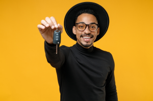 A person holding the keys to their new car near Carmel, Indiana