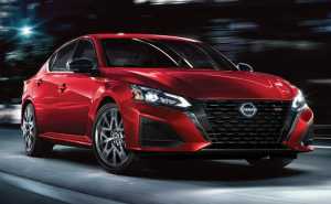 A red Nissan Altima driving near Indianapolis, Indiana