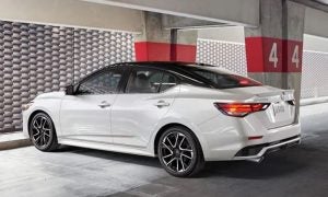 A white 2024 Nissan Sentra parked inside a parking garage near Indianapolis, Indiana