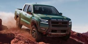 2025 Nissan Frontier tackling tough trails near ed martin nissan in Indianapolis, IN.