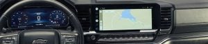 Chevrolet vehicle dashboard with infotainment system showing map.
