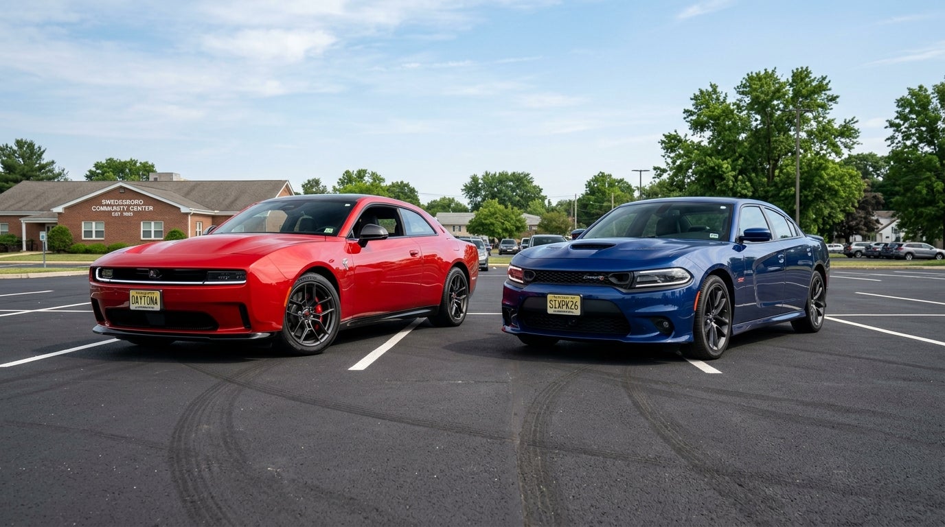 AI generated: Wide-angle, ground-level shot of a 2026 Dodge Charger Daytona and a 2026 Dodge Charger Sixpack parked side-by-side on a clean, asphalt lot in Swedesboro, New Jersey,