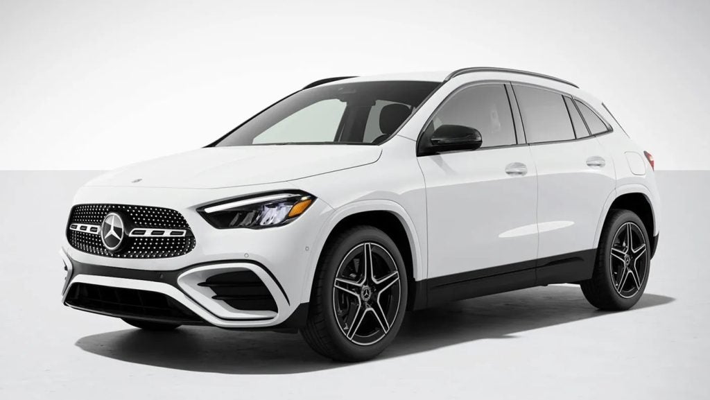 Side profile of the 2026 Mercedes-Benz GLC Hybrid in white, highlighting aerodynamic design and alloy wheels.