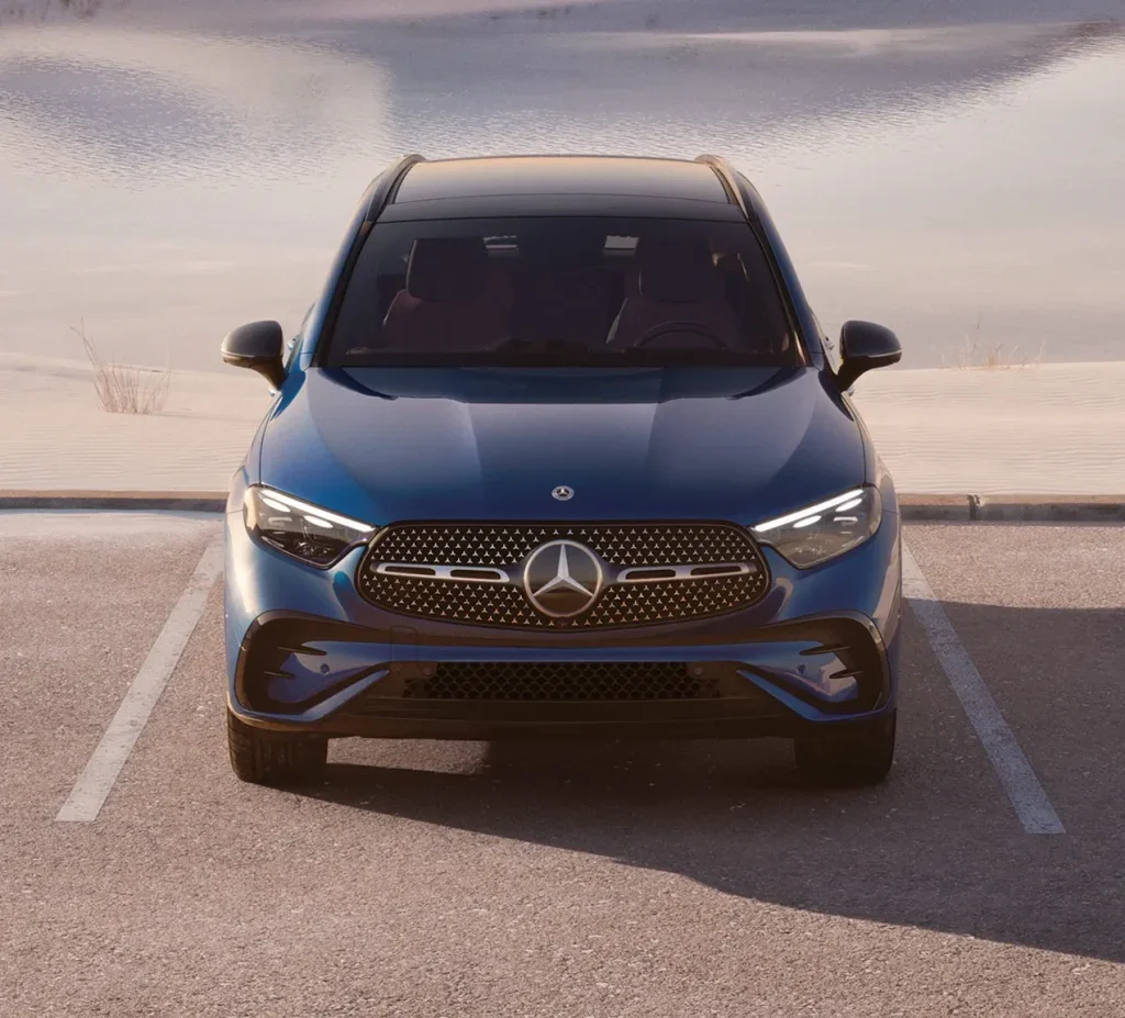 Front view of the 2026 Mercedes-Benz GLC compared to BMW X3, Audi Q5, and Volvo XC60 for size and design