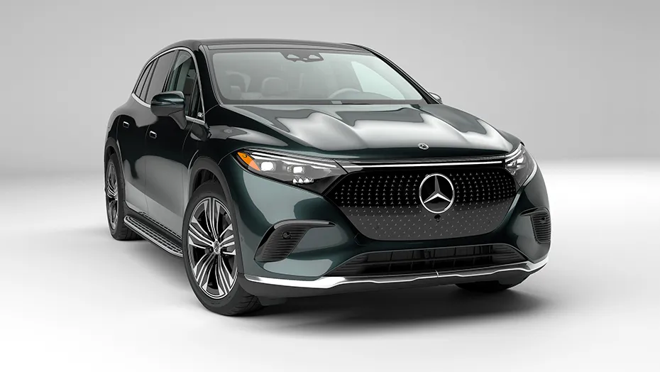 Front three-quarter view of a Mercedes-Benz EQS SUV in dark green, illustrating the fuel efficiency of the Mercedes-Benz EQS compared to other family SUVs.