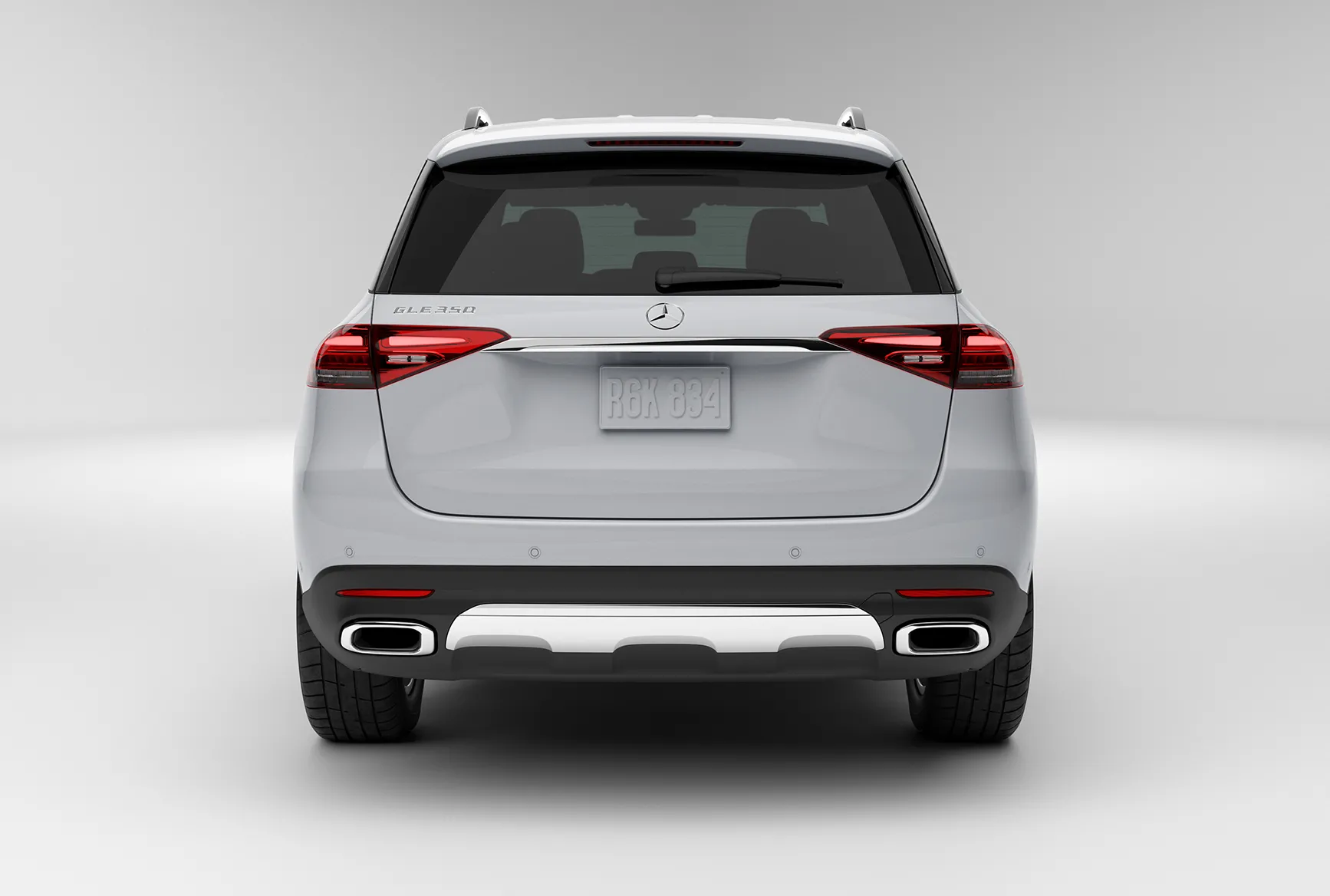 Rear view of a white 2027 Mercedes-Benz GLE with a spacious cargo area.
