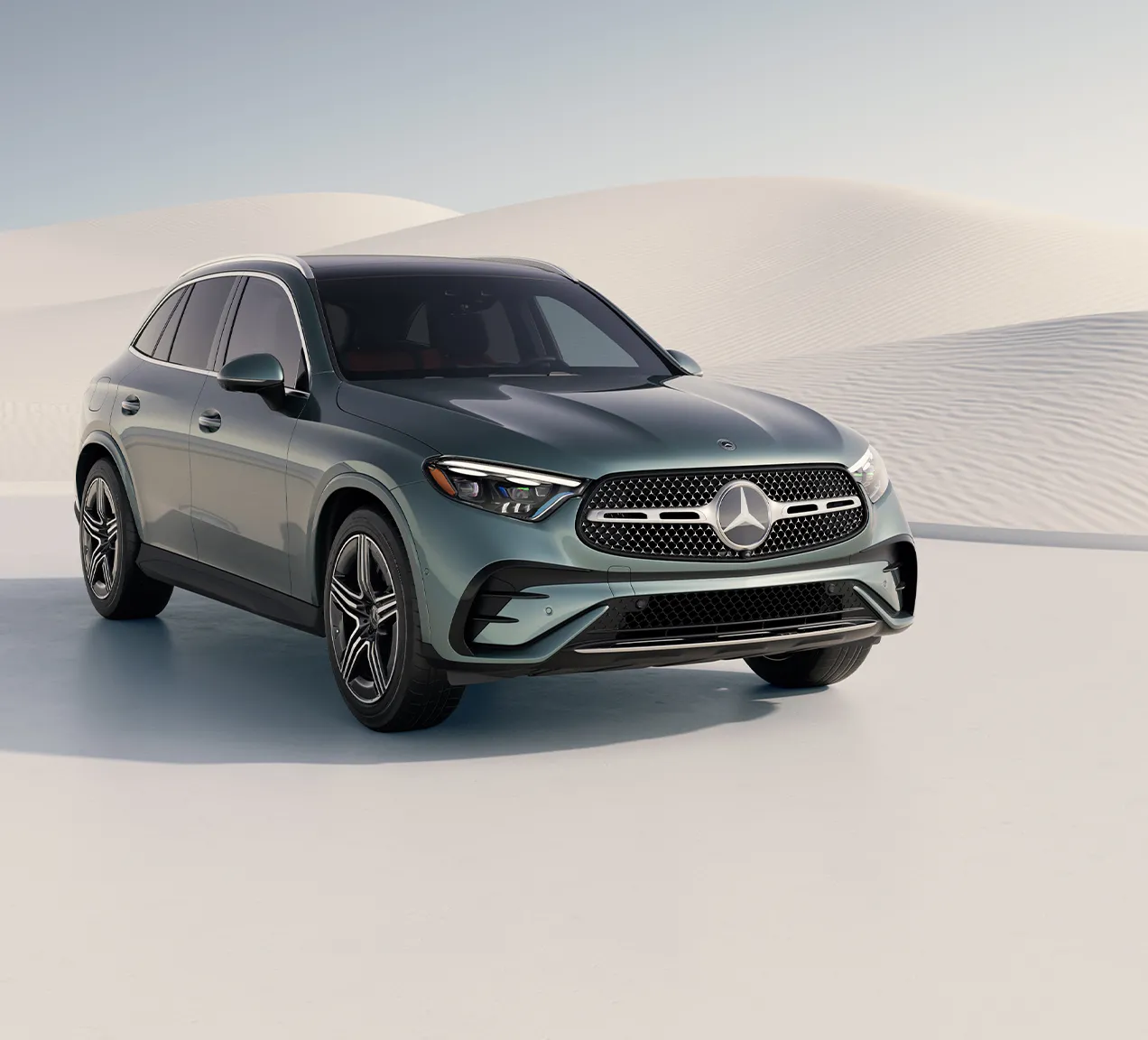 2026 Mercedes-Benz GLC exterior shown in a size comparison context against BMW X3, Audi Q5, and Volvo XC60