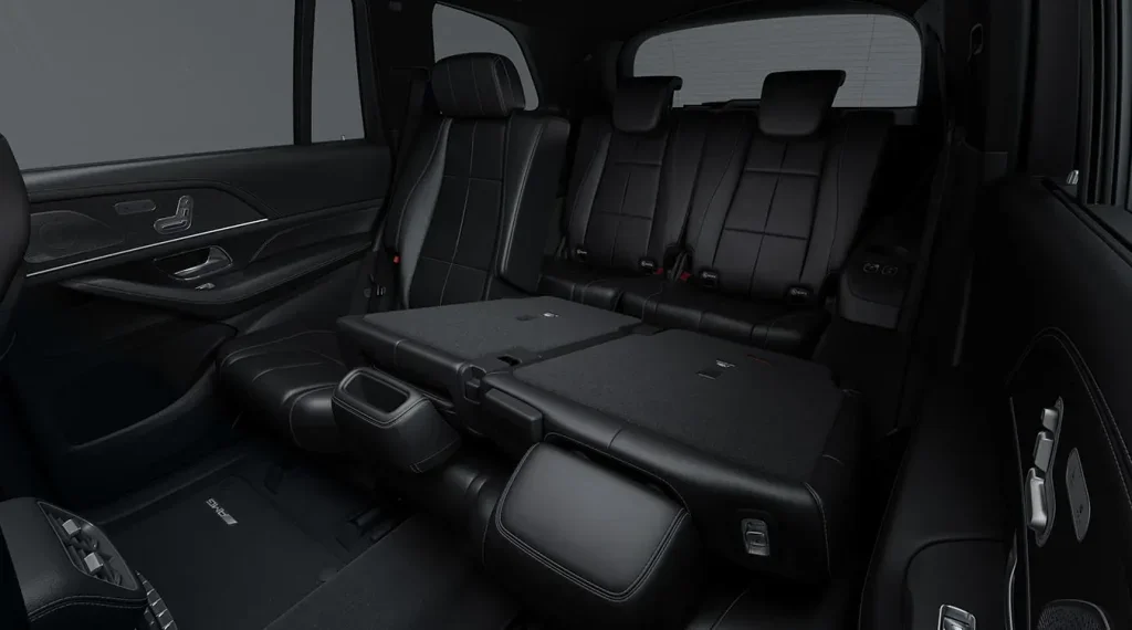 Rear seats inside a Mercedes-Benz GLS showing spacious passenger seating and child-seat-friendly safety features.