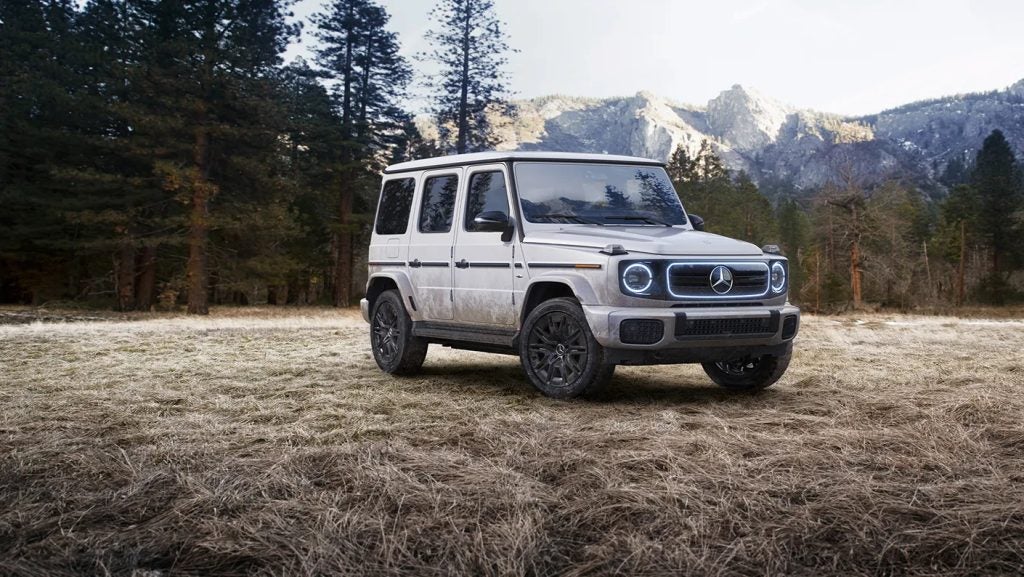 Mercedes-Benz G-Wagen climbing rocky terrain at night, symbolizing the rugged capability expected in a future Mini G-Wagen.