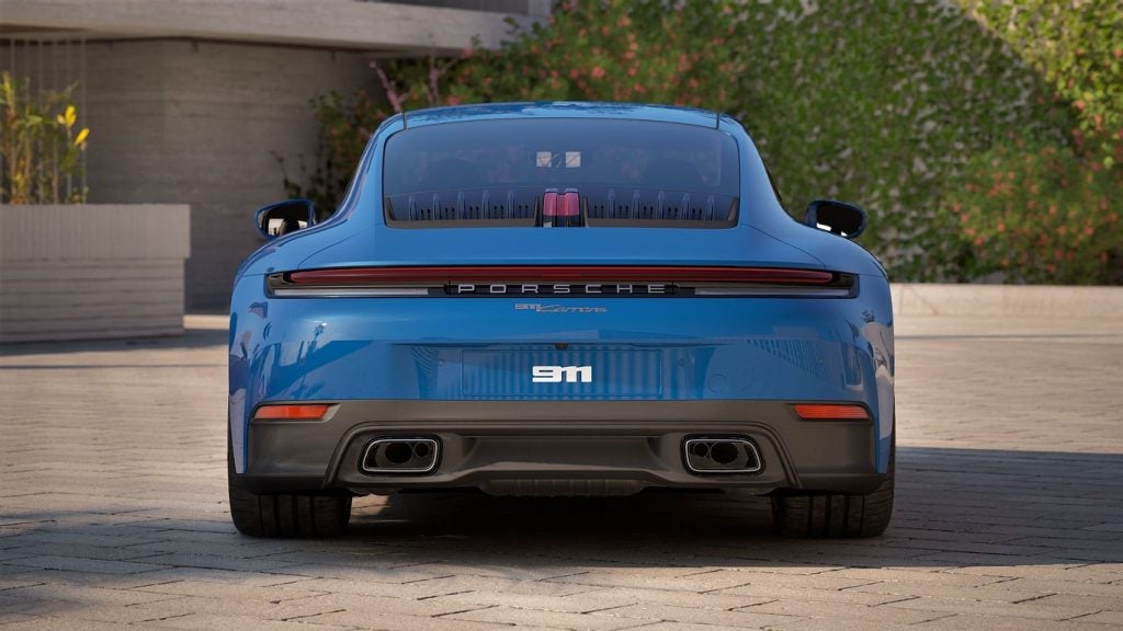 2026 Porsche 911 Carrera showcasing iconic sports car driving and classic Porsche DNA
