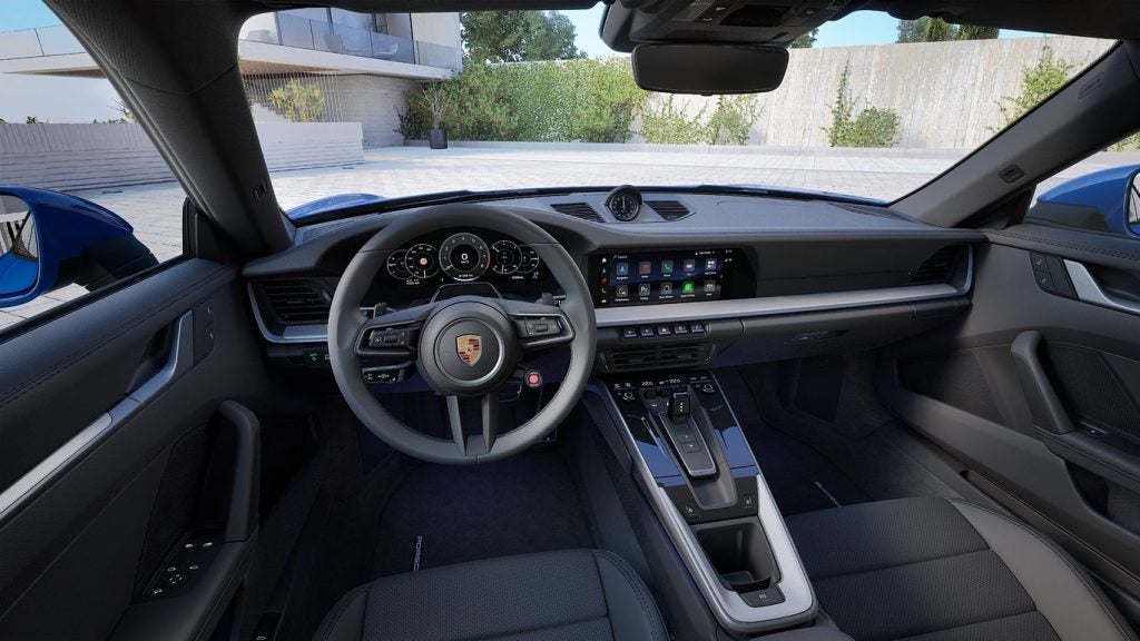 Rear view of the 2026 Porsche 911 Carrera highlighting iconic sports car design
