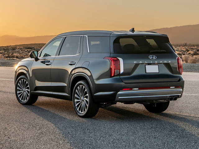 A black Hyundai Palisade parked outside