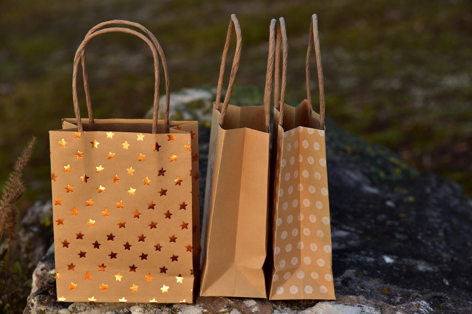 3 brown shopping bags