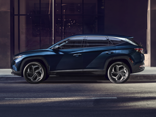 A blue Hyundai Tucson Hybrid