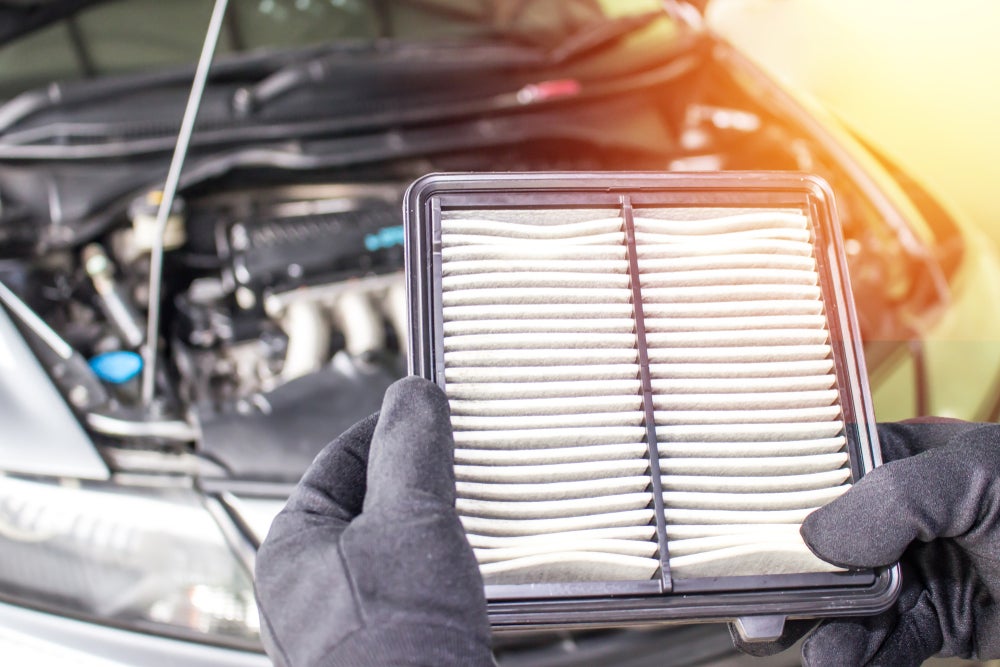 Hand,A,Man,Change,And,Check,Air,Filter,Of,Car