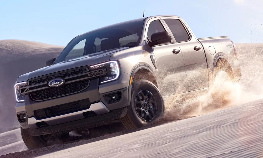 A 2024 Ford Ranger off-roading on a dusty landscape