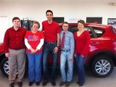 Mazda wearing red