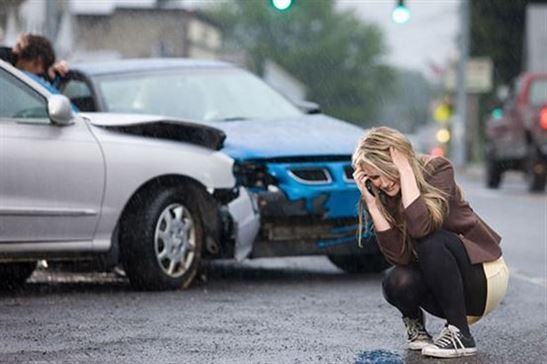 Driver Making Phone Call After Car Accident