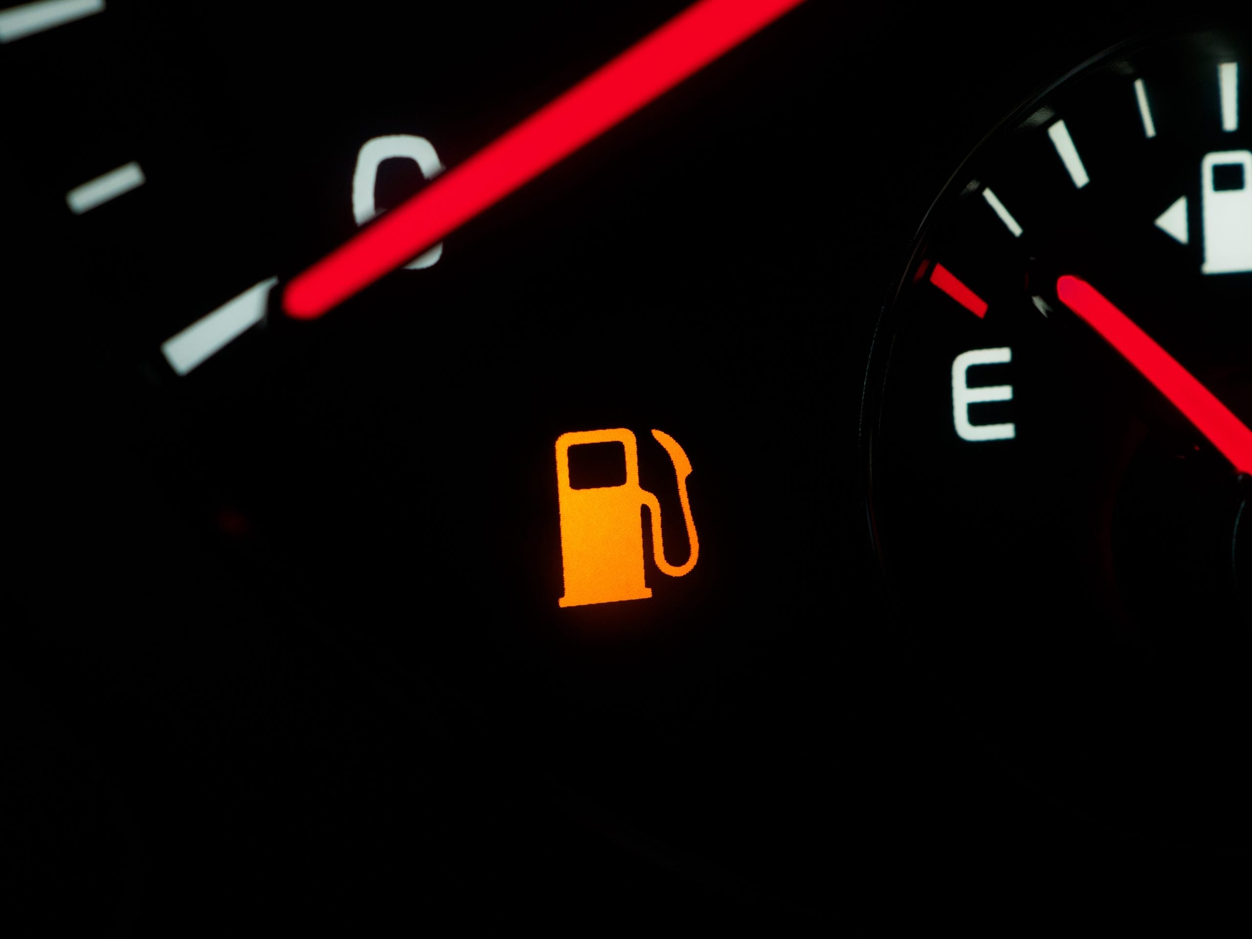 Illuminated Fuel Warning,Light,On,Car,Dashboard With Red And
