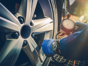 It is vital to check your vehicle's tire pressure regularly to improve handling and your safety on the road. If you ensure that your tires are always inflated to the proper pressure levels, it will save you money on gas and extend the life of your tires. In this article, your Nissan dealer explains how to check the tire pressure on your car and ensure they are inflated to the correct PSI.  Perform Tire Pressure Checks on Cold Tires Wait for the tires to cool down before you do a tire pressure check. A tire pressure reading will be affected if the tires are hot. Wait two to three hours for tires to cool down before checking the tire pressure. Find the Correct PSI You need to know the correct tire pressure level for each tire on your vehicle. You will find the correct PSI for your vehicle's tires on a sticker inside your driver's door. Your vehicle's owner's manual will also have information on the recommended tire pressure levels. If the tire pressure levels between the front and rear tires differ, write down the PSI for each tire on a piece of paper. Use a Tire Pressure Gauge Check the PSI of each tire with an analog or digital tire pressure gauge. An analog dial tire pressure gauge has a dial face with measurements, and an analog pen tire pressure gauge has a stick with numbers or a bar that moves upward to indicate the tire pressure level. The easiest is to use a battery-powered digital tire pressure gauge that gives a digital reading. Measuring the Tire Pressure You can start with any one of the tires on your car. Remove the valve cap and keep it in a safe place. Take your tire pressure gauge and press it against the valve stem until you hear a hissing sound. Hold the tire pressure gauge in place until you get a tire pressure reading. A digital tire pressure gauge will display the reading on a screen. The dial on a standard meter will point to the pressure, or a bar will move upward to show the tire pressure level. Write Down the Reading Write down the reading next to the recommended PSI for that specific tire. Perform a tire pressure reading on the rest of the tires. Remember to write down the reading next to the PSI for each tire. When you measure the tire pressure level of a tire, and it's correct, you can replace the valve cap. If you need to inflate the tire, keep the valve cap in a safe place until after you've increased the level to the correct PSI. Inflate the Tires You now have the tire pressure readings of all four tires. Compare the reading of each tire to the correct tire pressure level that you wrote down on the piece of paper. If the PSI of a tire is lower than the recommended tire pressure level, inflate the tire until it reaches the correct level. It's important not to overinflate the tires as it could cause damage to the tire. If you notice a tire is overinflated, you can push the back of the tire pressure gauge down on the metal pin in the valve stem to release the excess air. Replace the valve cap when the tire is inflated to the correct tire pressure level. Always keep your tires inflated to the correct tire pressure levels to prevent blowouts, decrease wear, and save you money on gas. We're passionate about offering you all of the most valuable automotive information here at DARCARS Nissan of Rockville. So if you don't want to stop there, check out our tips &amp; tricks blogs to keep learning today!