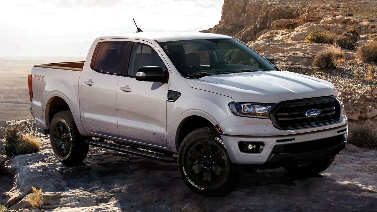Image of a white 2019 Ford Ranger parked on rocky terrain.
