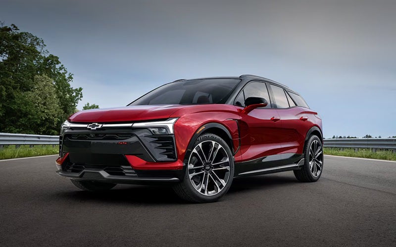 Chevrolet Blazer parked in the middle of a scenic road