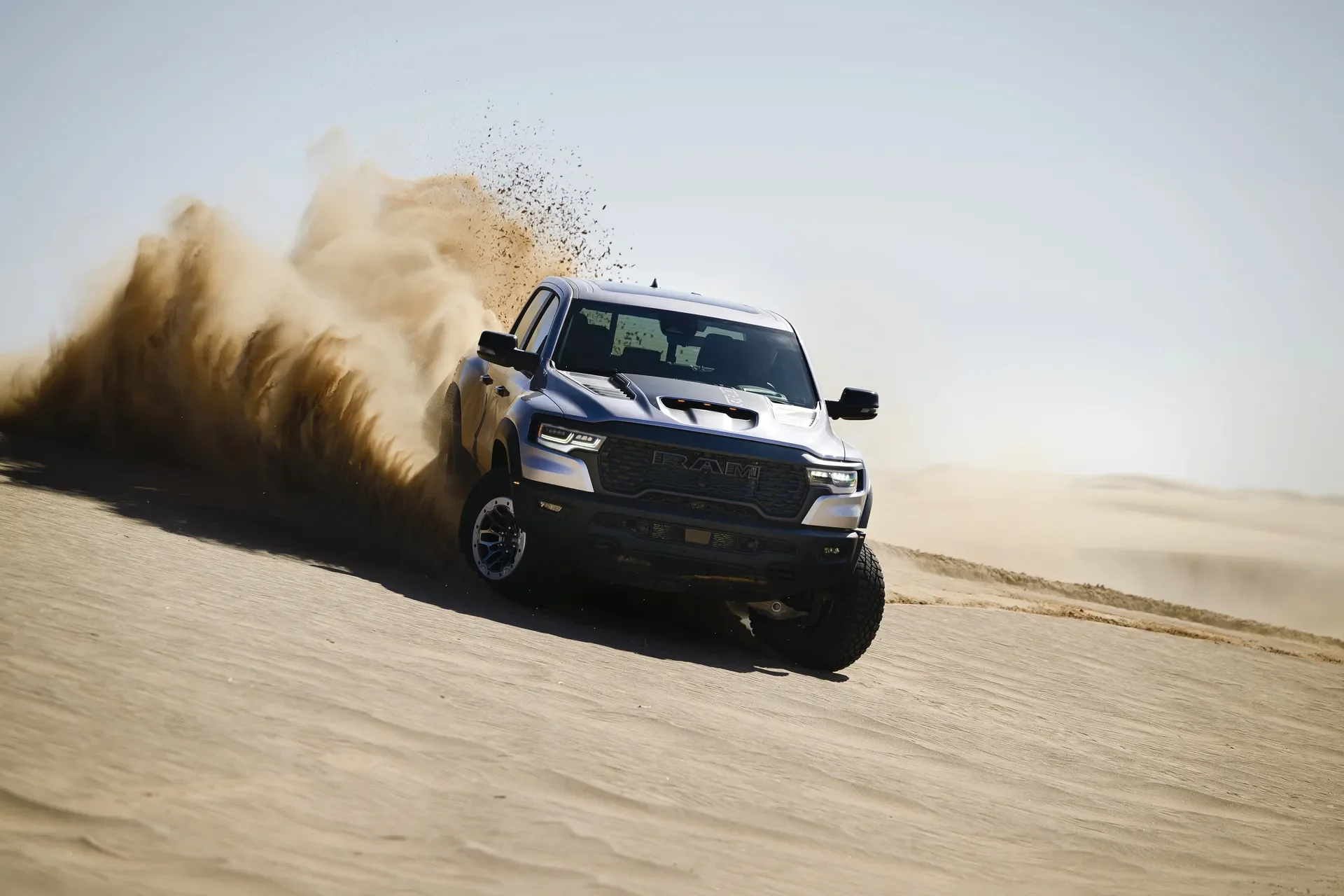 2025_Ram_1500_RHO_front_grille_offroad_sand_dunes_converted