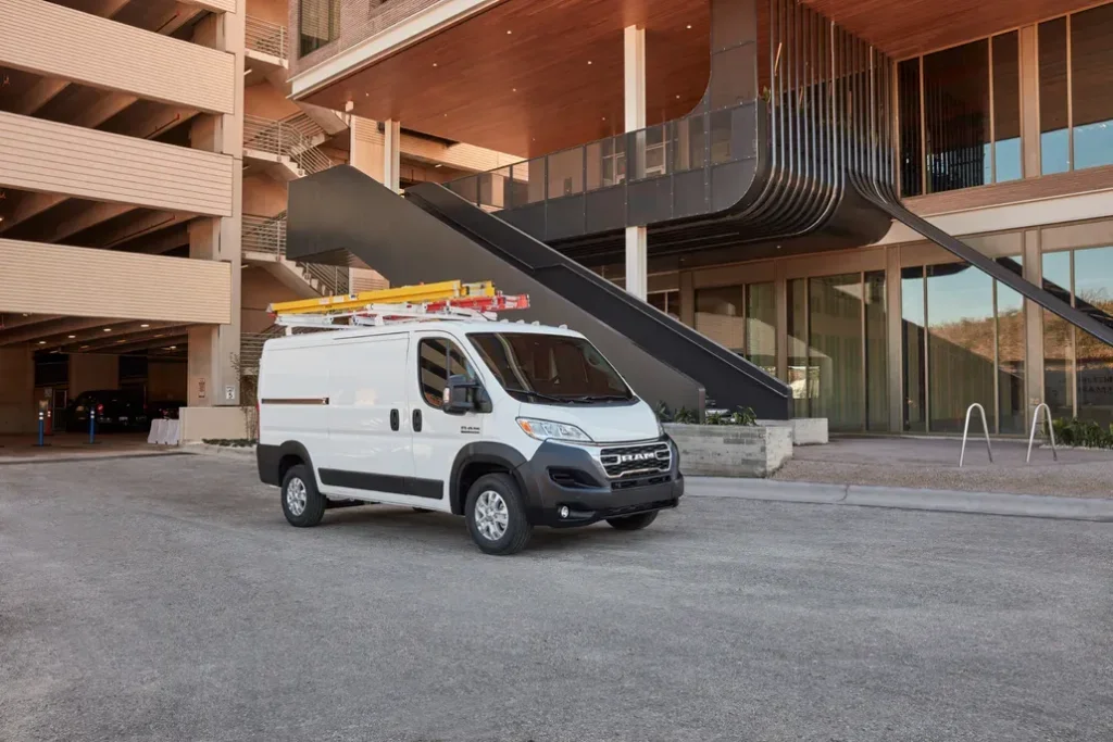 Ram ProMaster City Commercial Van Parked Front 3/4 View in Front of a City Building