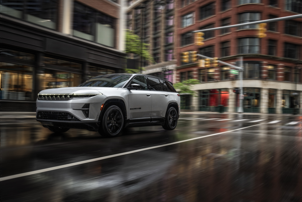 2024 Jeep® Wagoneer S Driving Through a City Front 3/4 View