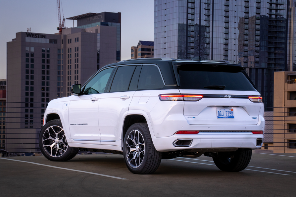 Jeep Grand Cherokee 4xe Parked Rear 3/4 View in a City