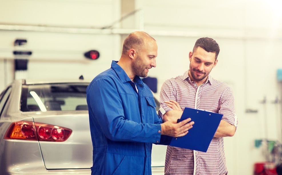 Mechanic talking to a client