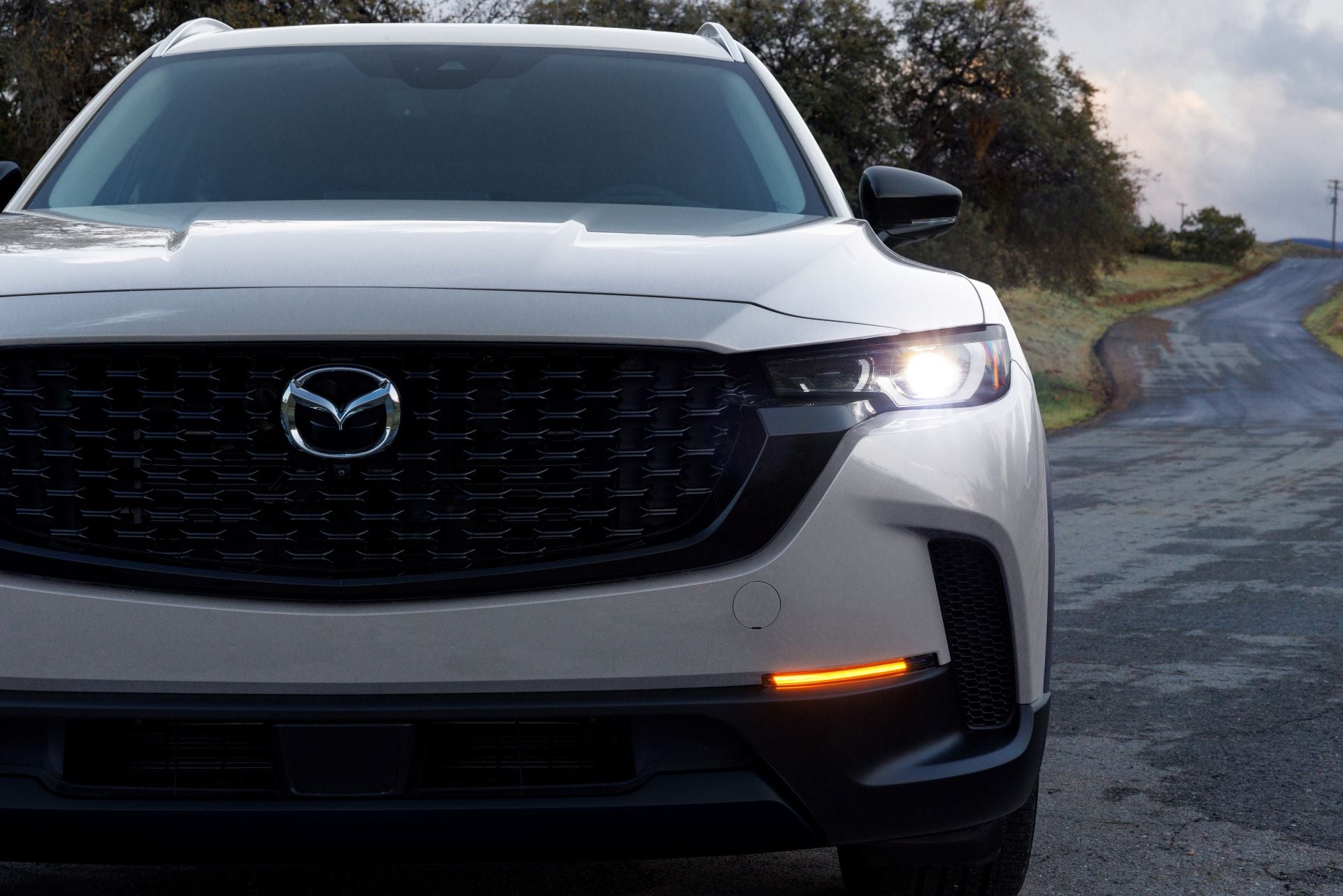 2025_Mazda_CX-50_Hybrid_Front_Exterior_Scenic_Image-web