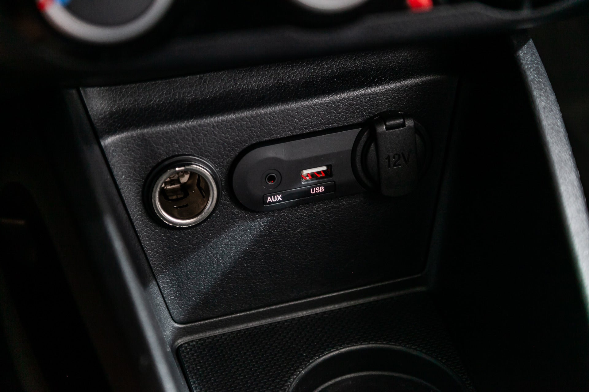 Car Cigarette lighter with USB port and aux port nearby