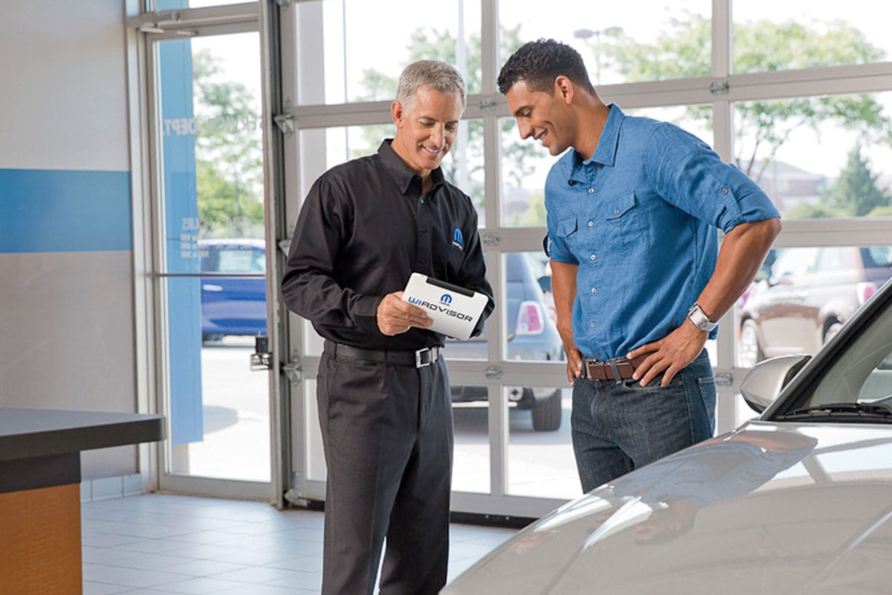 Service advisor speaking with customer